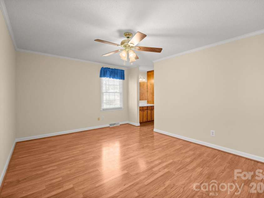 7737 Ridgeloch Place, Charlotte, NC 28226.  MLS# CAR4357956, YatesRealty ID 15304. Primary Bedroom 