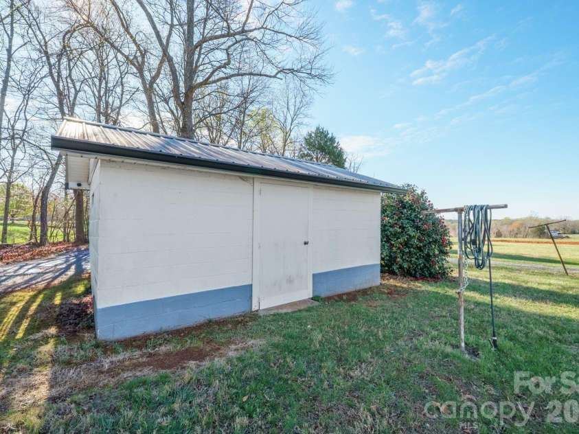 5588 River Bend Road, Claremont, NC 28610.  MLS# CAR4352896, YatesRealty ID 15306. Old canning Shed - Storage