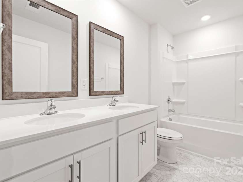 52 Shorthorn Road, Fletcher, NC 28732.  MLS# CAR4254863, YatesRealty ID 15308. Photos are representative