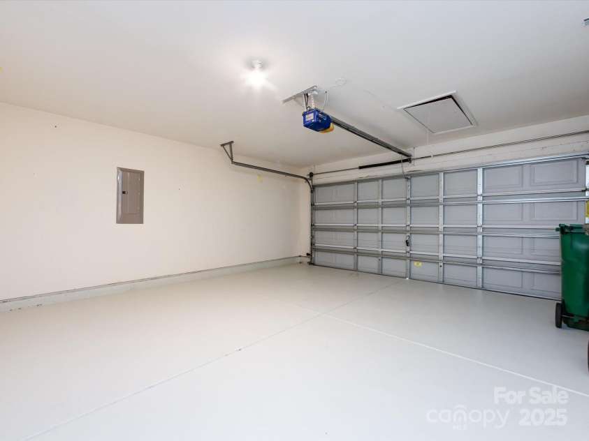 521 Ellingsworth Lane, Charlotte, NC 28214.  MLS# CAR4252479, YatesRealty ID 15310. Fully finished garage