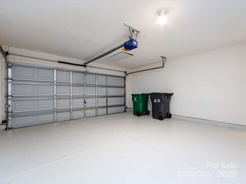 521 Ellingsworth Lane, Charlotte, NC 28214.  MLS# CAR4252479, YatesRealty ID 15310. Garage with epoxied floors