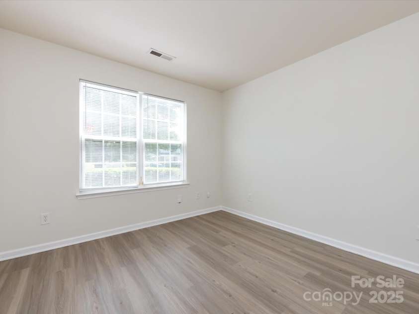 521 Ellingsworth Lane, Charlotte, NC 28214.  MLS# CAR4252479, YatesRealty ID 15310. Main level guest suite