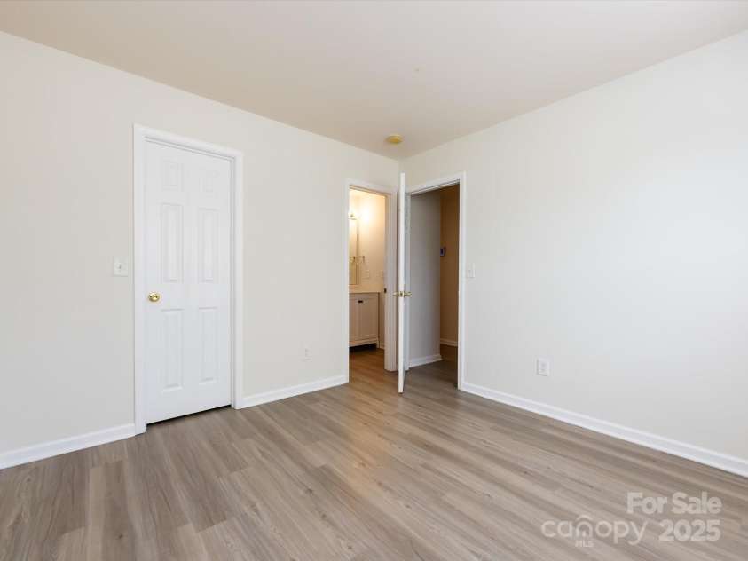 521 Ellingsworth Lane, Charlotte, NC 28214.  MLS# CAR4252479, YatesRealty ID 15310. Main level guest suite