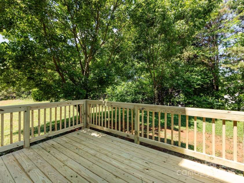 521 Ellingsworth Lane, Charlotte, NC 28214.  MLS# CAR4252479, YatesRealty ID 15310. New deck backs to your private lot