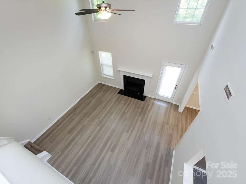 521 Ellingsworth Lane, Charlotte, NC 28214.  MLS# CAR4252479, YatesRealty ID 15310. View of living room from 2nd floor