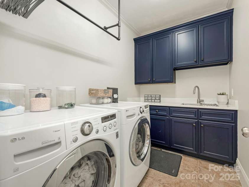 1814 Therrell Farms Road, Waxhaw, NC 28173.  MLS# CAR4257408, YatesRealty ID 15312. Laundry Room