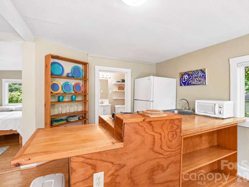 75 Cisco Road, Asheville, NC 28805.  MLS# CAR4425797, YatesRealty ID 15312. Cottage layout from dining