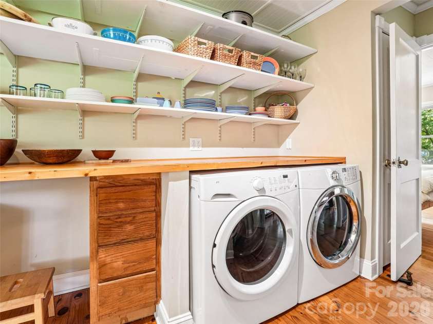 75 Cisco Road, Asheville, NC 28805.  MLS# CAR4425797, YatesRealty ID 15312. Efficient laundry hall