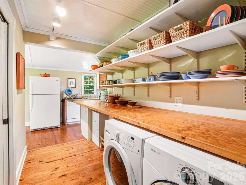 75 Cisco Road, Asheville, NC 28805.  MLS# CAR4425797, YatesRealty ID 15312. Laundry area