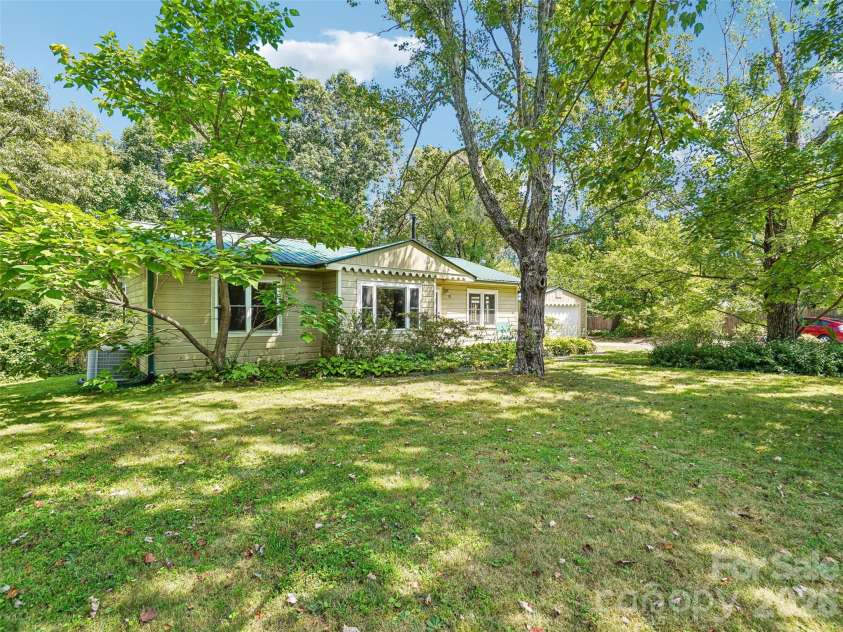 75 Cisco Road, Asheville, NC 28805.  MLS# CAR4425797, YatesRealty ID 15312. Level, park like setting