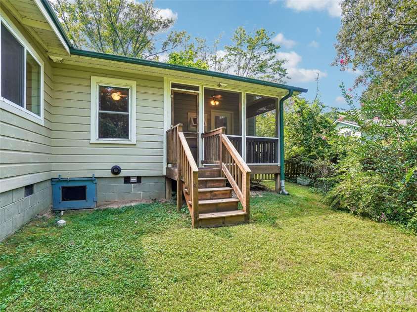 75 Cisco Road, Asheville, NC 28805.  MLS# CAR4425797, YatesRealty ID 15312. Steps from screen porch to back yard