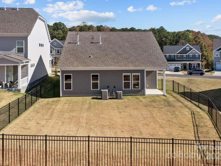 197 Tetcott Street, Mooresville, NC 28115.  MLS# CAR4238933, YatesRealty ID 15313. Awesome fenced in back yard.