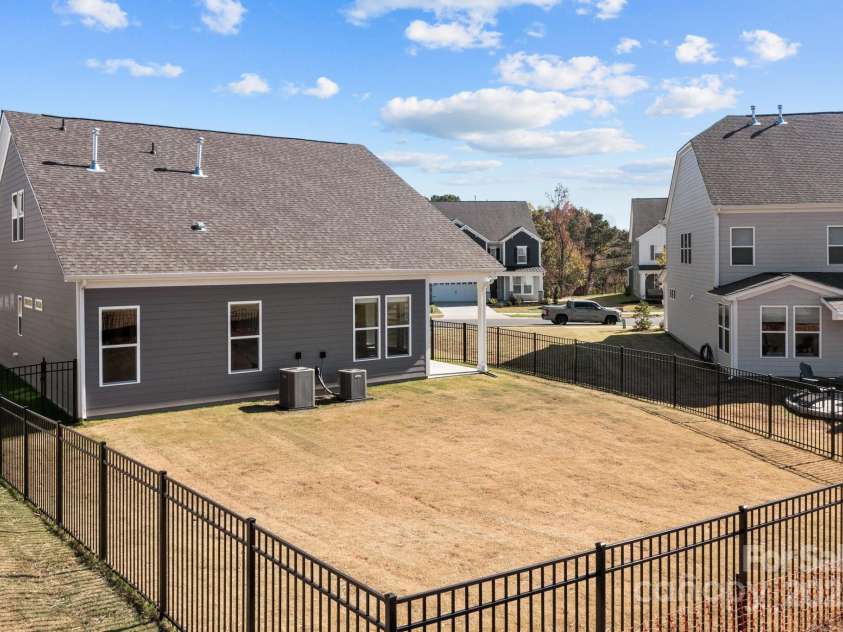 197 Tetcott Street, Mooresville, NC 28115.  MLS# CAR4238933, YatesRealty ID 15313. Extra room with angled side yard.