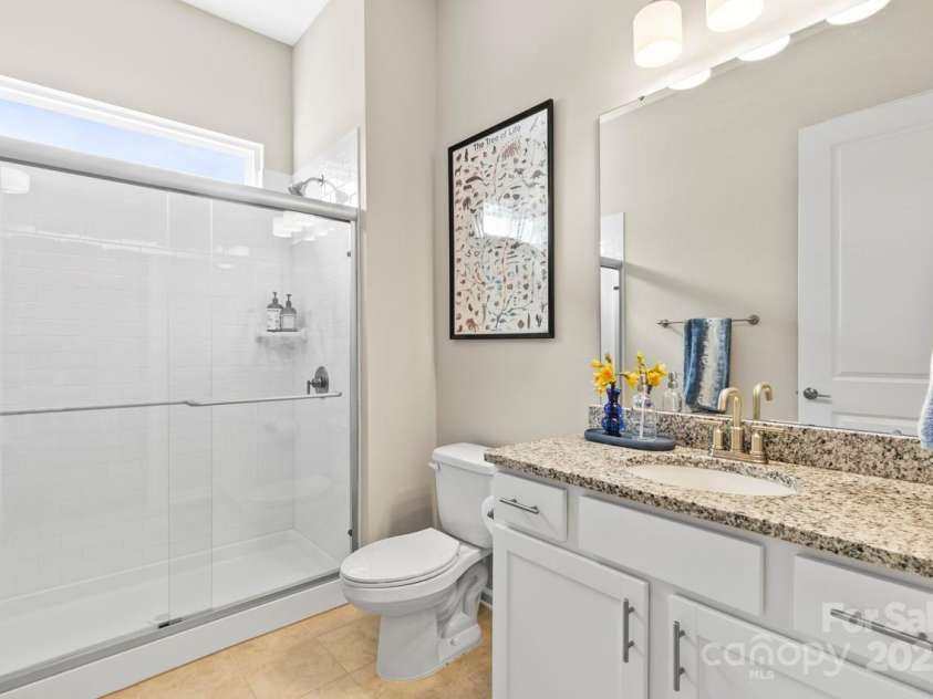 197 Tetcott Street, Mooresville, NC 28115.  MLS# CAR4238933, YatesRealty ID 15313. Main floor full bathroom