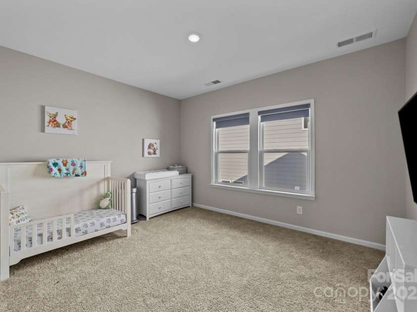 197 Tetcott Street, Mooresville, NC 28115.  MLS# CAR4238933, YatesRealty ID 15313. Upstairs bedroom