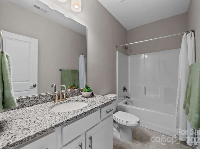 197 Tetcott Street, Mooresville, NC 28115.  MLS# CAR4238933, YatesRealty ID 15313. Upstairs full bathroom