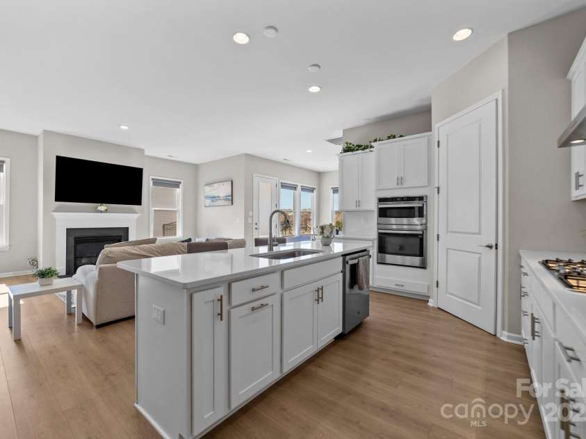197 Tetcott Street, Mooresville, NC 28115.  MLS# CAR4238933, YatesRealty ID 15313. View of kitchen over family room