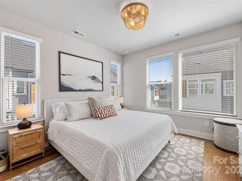 2123 Bryant Park Drive, Charlotte, NC 28208.  MLS# CAR4252518, YatesRealty ID 15314. Light filled primary bedroom