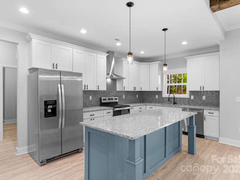 142 Crystal Heights Drive, Hendersonville, NC 28739.  MLS# CAR4310051, YatesRealty ID 15316. Open Kitchen Plan