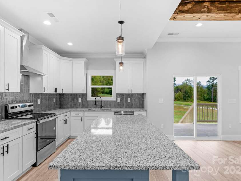 142 Crystal Heights Drive, Hendersonville, NC 28739.  MLS# CAR4310051, YatesRealty ID 15316. Open Kitchen Plan