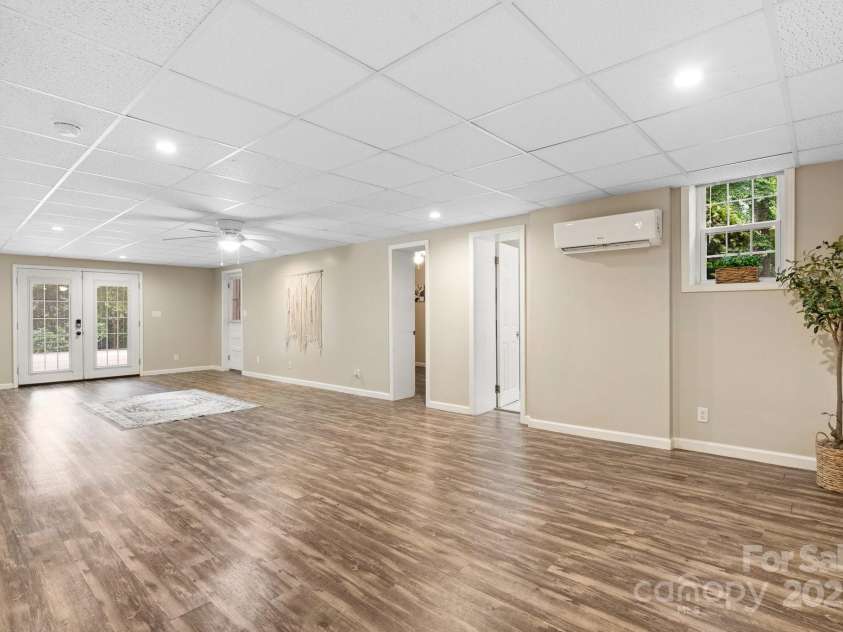 220 Pinehurst Lane, Newton, NC 28658.  MLS# CAR4258457, YatesRealty ID 15317. Lower Level Family Room