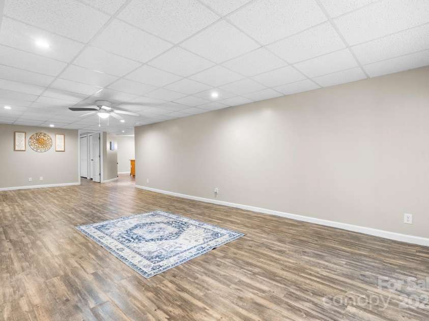 220 Pinehurst Lane, Newton, NC 28658.  MLS# CAR4258457, YatesRealty ID 15317. Lower Level Family Room