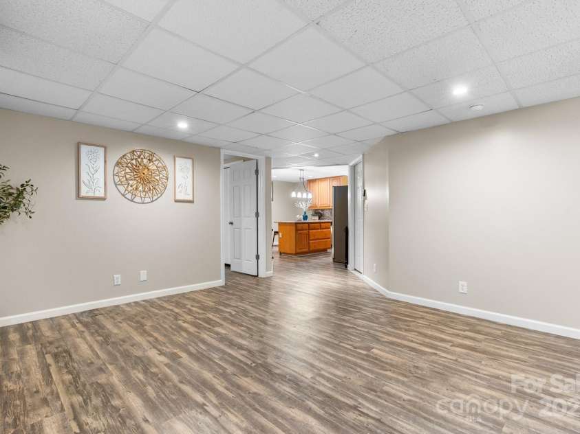 220 Pinehurst Lane, Newton, NC 28658.  MLS# CAR4258457, YatesRealty ID 15317. Lower Level Family Room