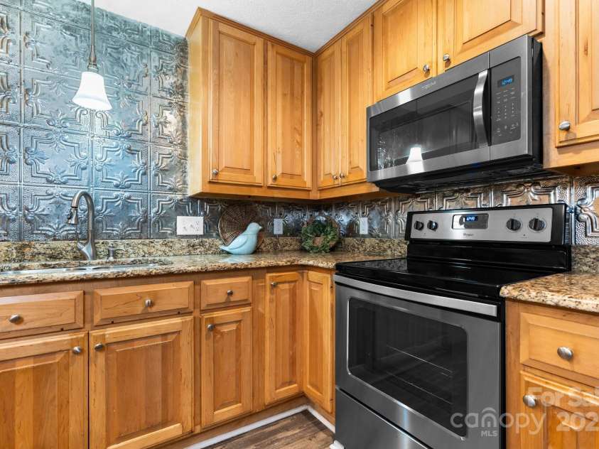 220 Pinehurst Lane, Newton, NC 28658.  MLS# CAR4258457, YatesRealty ID 15317. Lower Level Kitchen