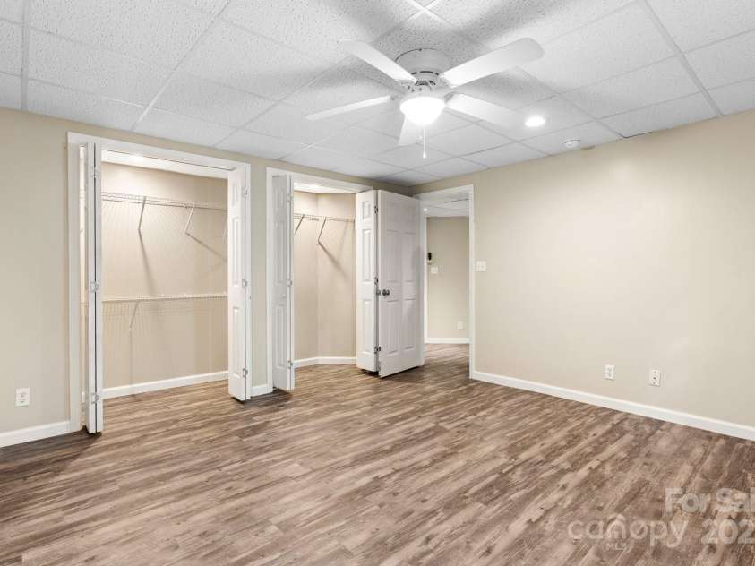 220 Pinehurst Lane, Newton, NC 28658.  MLS# CAR4258457, YatesRealty ID 15317. Lower Level Primary Bedroom