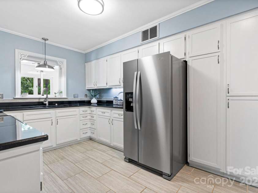 220 Pinehurst Lane, Newton, NC 28658.  MLS# CAR4258457, YatesRealty ID 15317. Upper Level Kitchen