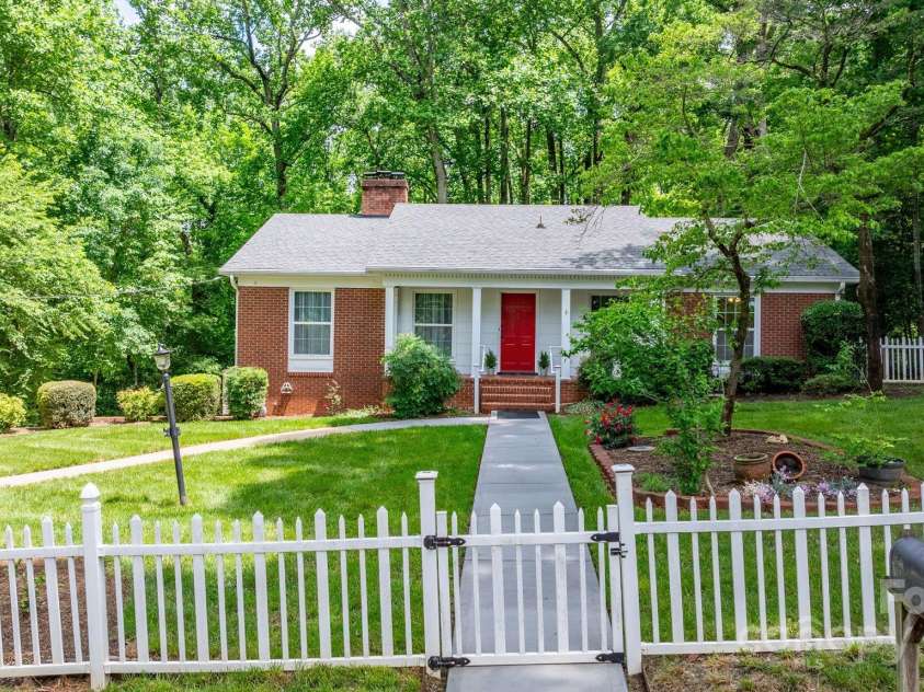 220 Pinehurst Lane, Newton, NC 28658.  MLS# CAR4258457, YatesRealty ID 15317. White picket fence