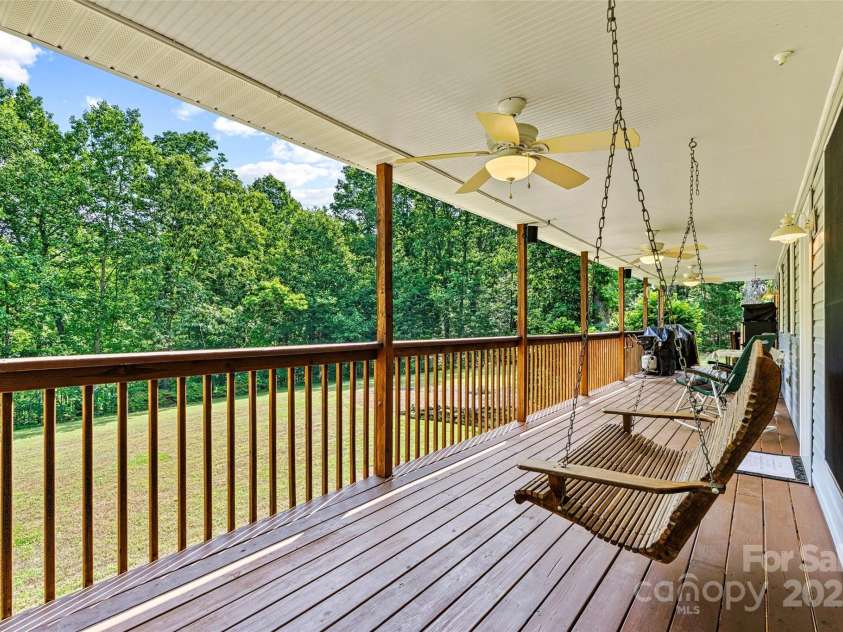 6992 Sherrills Ford Road, Sherrills Ford, NC 28673.  MLS# CAR4259782, YatesRealty ID 15318. Back porch swing view