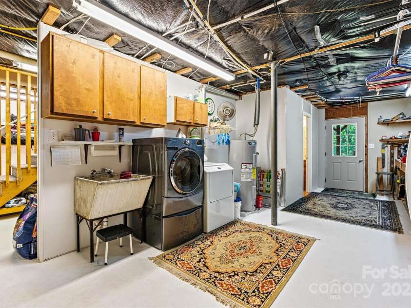 6992 Sherrills Ford Road, Sherrills Ford, NC 28673.  MLS# CAR4259782, YatesRealty ID 15318. Laundry area and workspace in the basement