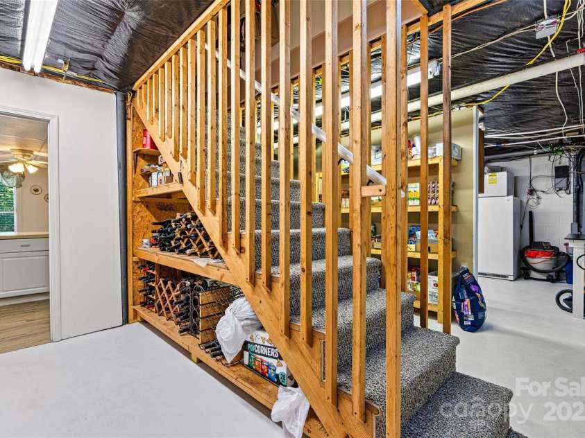 6992 Sherrills Ford Road, Sherrills Ford, NC 28673.  MLS# CAR4259782, YatesRealty ID 15318. Stairs from main level to the basement