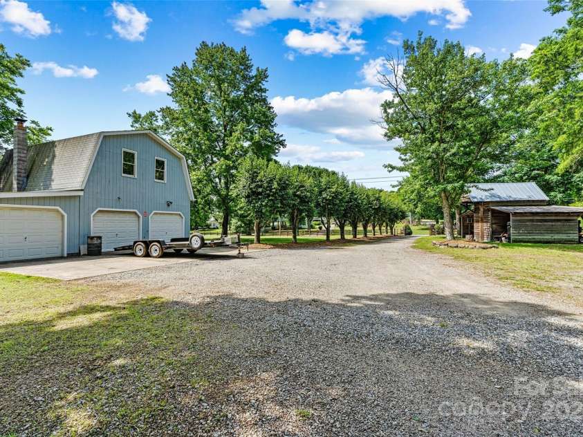 6992 Sherrills Ford Road, Sherrills Ford, NC 28673.  MLS# CAR4259782, YatesRealty ID 15318. View of garage and barn area