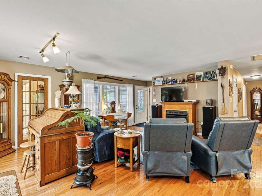 6992 Sherrills Ford Road, Sherrills Ford, NC 28673.  MLS# CAR4259782, YatesRealty ID 15318. View of living room from kitchen main level