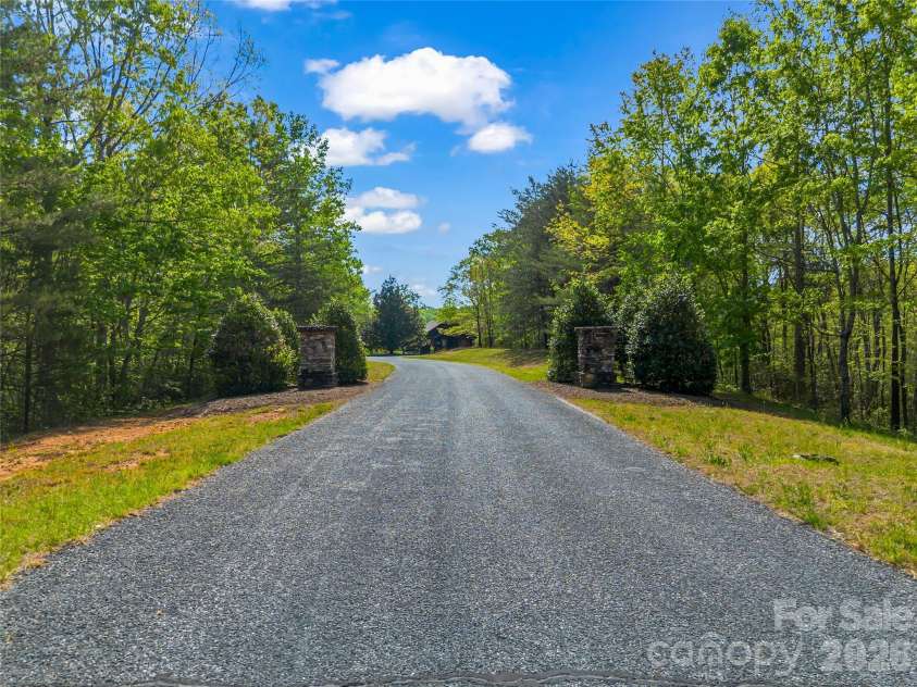 454 Fallen Tree Lane, Mill Spring, NC 28756.  MLS# CAR4371393, YatesRealty ID 15320. Entrance to Fallen Tree Cul de sac 
