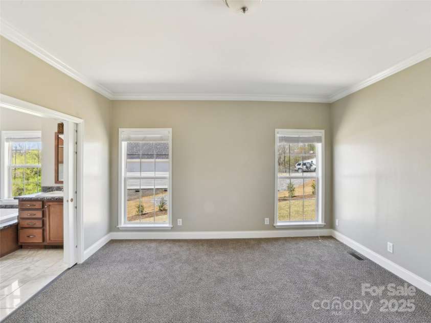 25 Colby Drive, Weaverville, NC 28787.  MLS# CAR4243387, YatesRealty ID 15327. Primary Bedroom