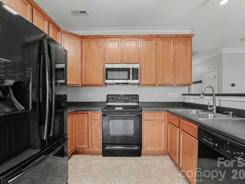 1440 Duckhorn Street, Concord, NC 28027.  MLS# CAR4348950, YatesRealty ID 15329. Kitchen From Dining Room