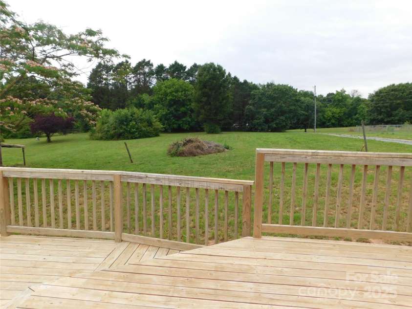 3001 Austin Chaney Road, Monroe, NC 28110.  MLS# CAR4263801, YatesRealty ID 15329. Back yard view