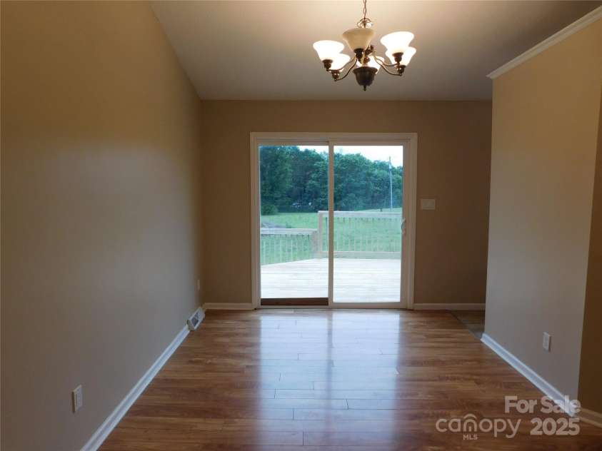 3001 Austin Chaney Road, Monroe, NC 28110.  MLS# CAR4263801, YatesRealty ID 15329. Dining area