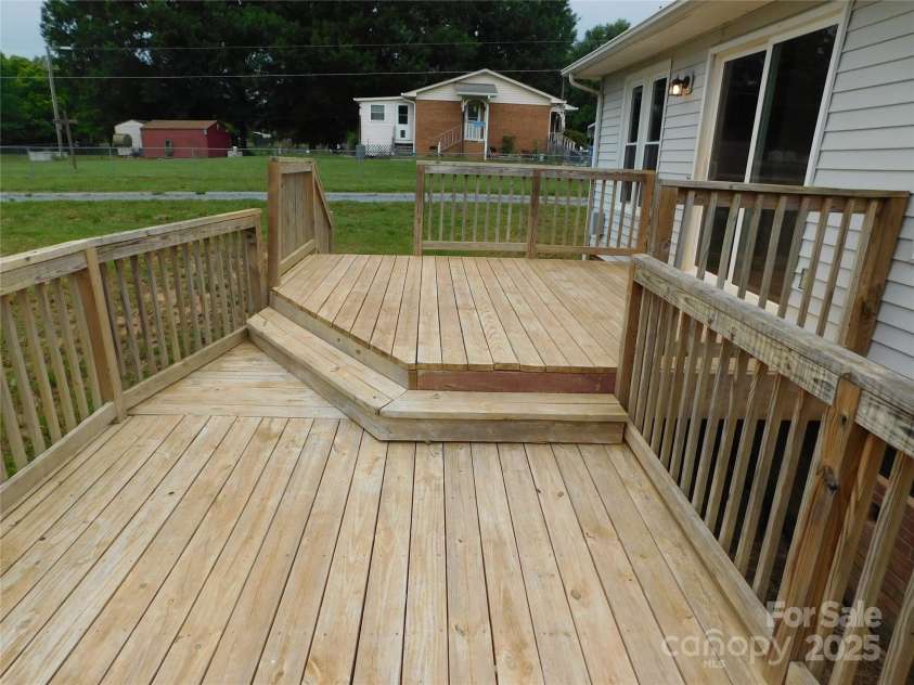 3001 Austin Chaney Road, Monroe, NC 28110.  MLS# CAR4263801, YatesRealty ID 15329. New 12 x 24 deck
