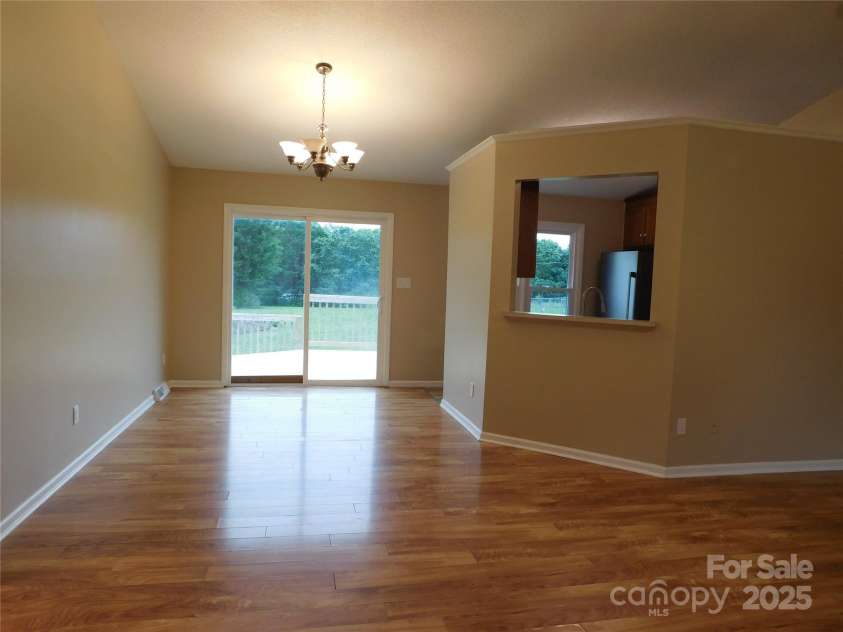 3001 Austin Chaney Road, Monroe, NC 28110.  MLS# CAR4263801, YatesRealty ID 15329. View from front door