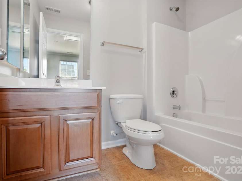 7753 Jackson Pond Drive, Charlotte, NC 28273.  MLS# CAR4247496, YatesRealty ID 15330. Bedroom 2 En Suite Full Bath