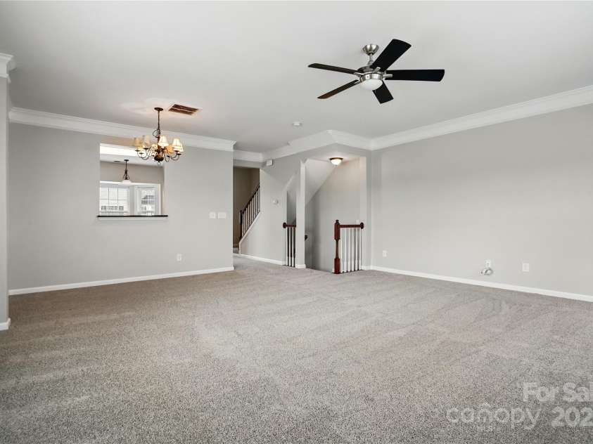 7753 Jackson Pond Drive, Charlotte, NC 28273.  MLS# CAR4247496, YatesRealty ID 15330. Great Room and Dining Area