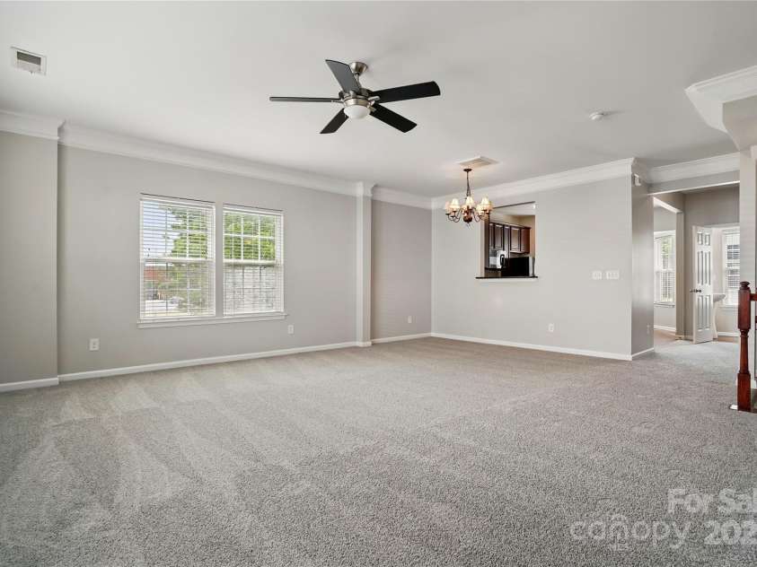 7753 Jackson Pond Drive, Charlotte, NC 28273.  MLS# CAR4247496, YatesRealty ID 15330. Great Room and Dining Area