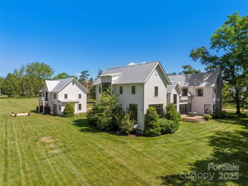 146 Lower Brush Creek Road, Fletcher, NC 28732.  MLS# CAR4262827, YatesRealty ID 15331. Main house and Guest House