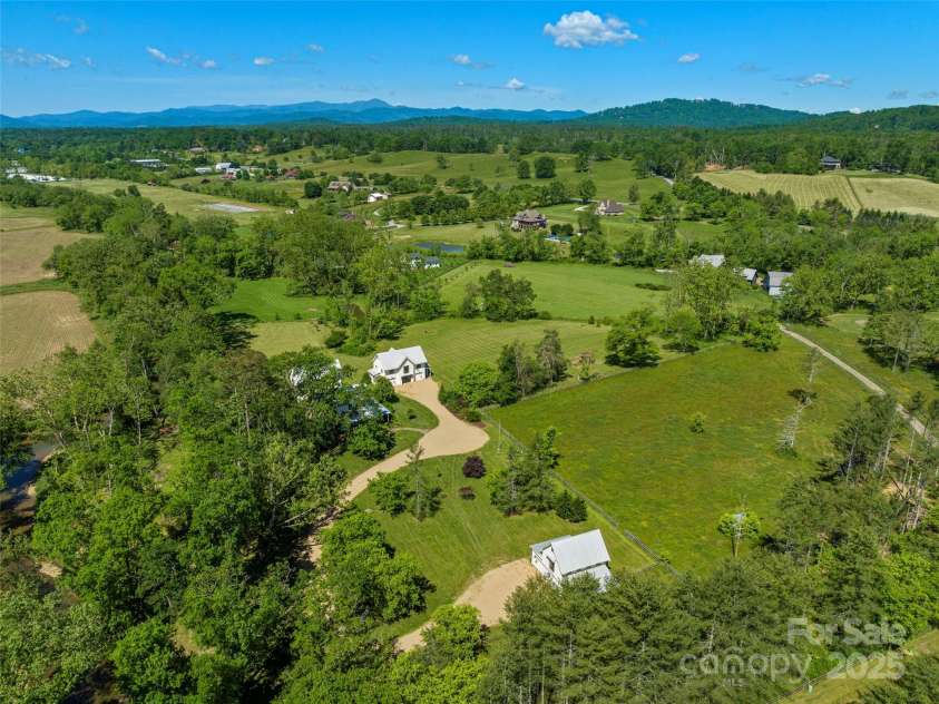146 Lower Brush Creek Road, Fletcher, NC 28732.  MLS# CAR4262827, YatesRealty ID 15331. Space to create and play.