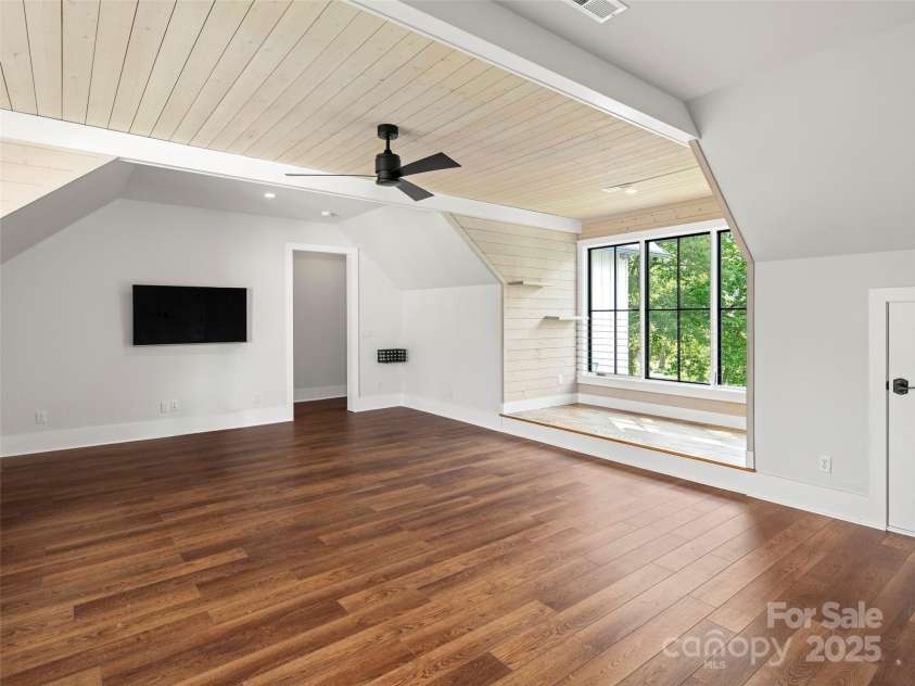 146 Lower Brush Creek Road, Fletcher, NC 28732.  MLS# CAR4262827, YatesRealty ID 15331. Upstairs entertaining living room