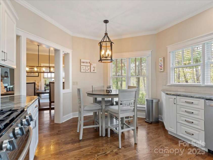 28 Lacoste Drive, Hendersonville, NC 28739.  MLS# CAR4246856, YatesRealty ID 15335. Custom dine in kitchen with gas and granite